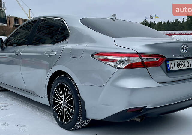 Серый Тойота Камри, объемом двигателя 2.49 л и пробегом 86 тыс. км за 22100 $, фото 1 на Automoto.ua