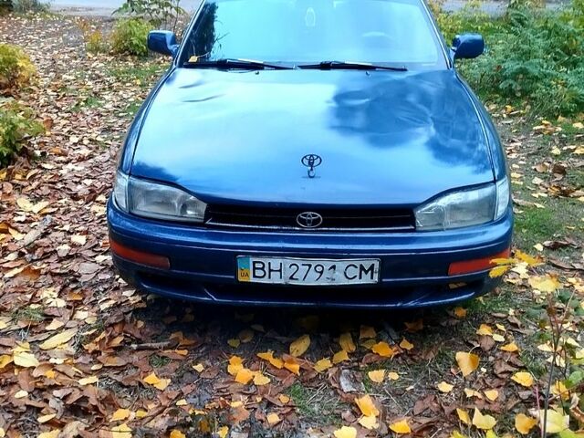 Синій Тойота Камрі, об'ємом двигуна 2.2 л та пробігом 123 тис. км за 1300 $, фото 1 на Automoto.ua