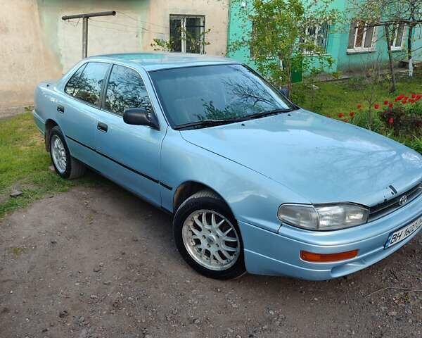 Синий Тойота Камри, объемом двигателя 2.16 л и пробегом 370 тыс. км за 2200 $, фото 1 на Automoto.ua