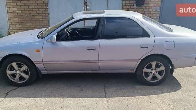 Синий Тойота Камри, объемом двигателя 3 л и пробегом 336 тыс. км за 3200 $, фото 1 на Automoto.ua