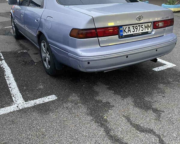 Синий Тойота Камри, объемом двигателя 3 л и пробегом 300 тыс. км за 3000 $, фото 1 на Automoto.ua