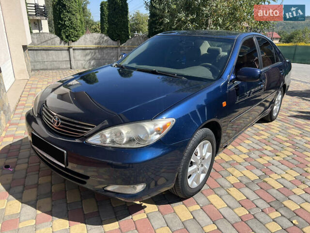 Синий Тойота Камри, объемом двигателя 3 л и пробегом 324 тыс. км за 5600 $, фото 1 на Automoto.ua