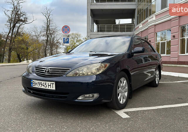 Синій Тойота Камрі, об'ємом двигуна 3 л та пробігом 415 тис. км за 5900 $, фото 1 на Automoto.ua