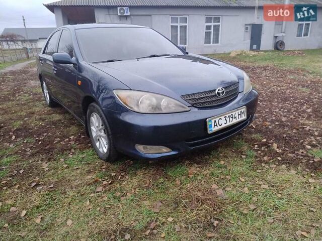 Синий Тойота Камри, объемом двигателя 2.36 л и пробегом 228 тыс. км за 4650 $, фото 1 на Automoto.ua