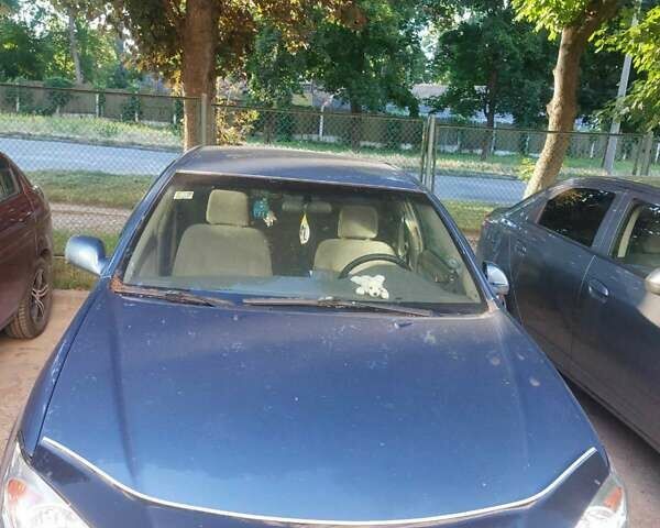 Синий Тойота Камри, объемом двигателя 2.4 л и пробегом 600 тыс. км за 5200 $, фото 1 на Automoto.ua