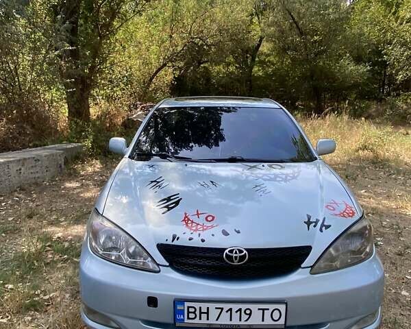 Синий Тойота Камри, объемом двигателя 3 л и пробегом 225 тыс. км за 5000 $, фото 1 на Automoto.ua