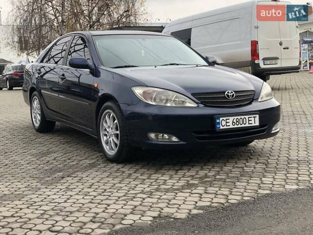 Синій Тойота Камрі, об'ємом двигуна 3 л та пробігом 265 тис. км за 7200 $, фото 1 на Automoto.ua