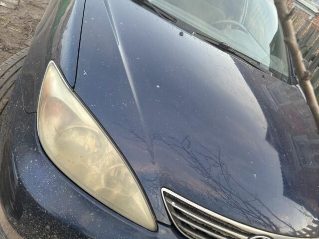 Синий Тойота Камри, объемом двигателя 2.4 л и пробегом 500 тыс. км за 3500 $, фото 1 на Automoto.ua