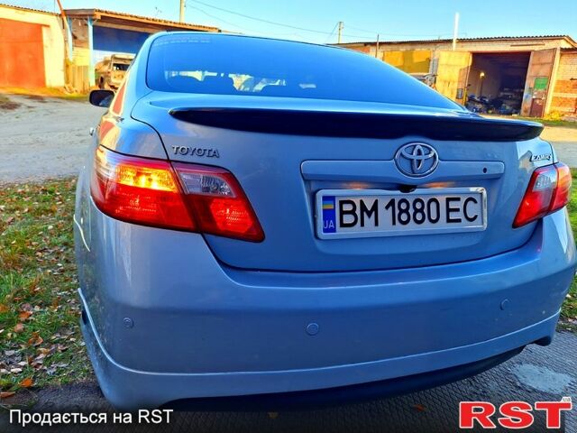 Синий Тойота Камри, объемом двигателя 2.4 л и пробегом 247 тыс. км за 7000 $, фото 1 на Automoto.ua