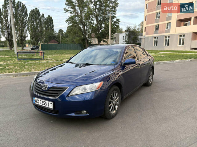 Синій Тойота Камрі, об'ємом двигуна 2.4 л та пробігом 275 тис. км за 9400 $, фото 1 на Automoto.ua