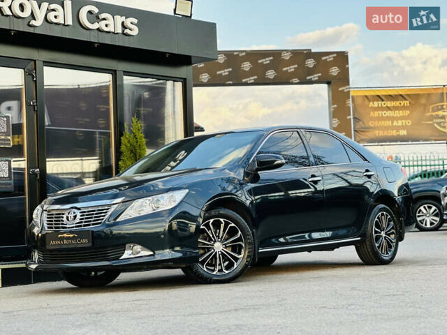 Синій Тойота Камрі, об'ємом двигуна 2.49 л та пробігом 231 тис. км за 12700 $, фото 1 на Automoto.ua