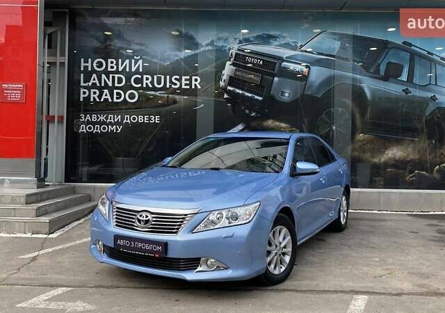 Синій Тойота Камрі, об'ємом двигуна 2.5 л та пробігом 77 тис. км за 15911 $, фото 1 на Automoto.ua