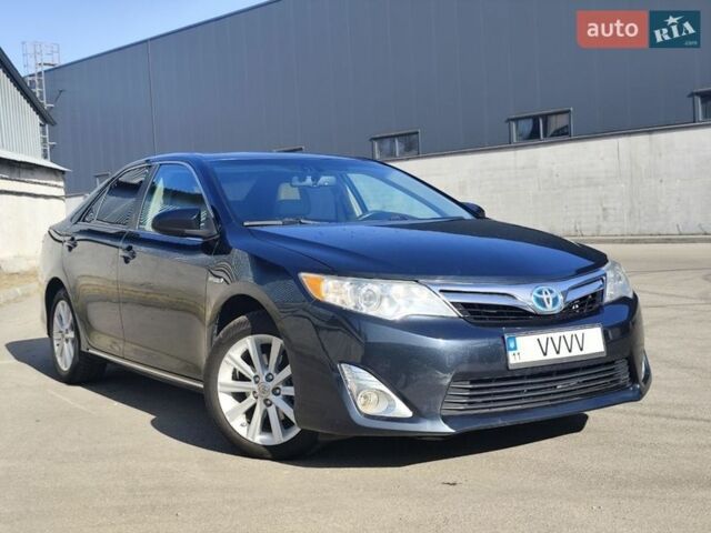 Синій Тойота Камрі, об'ємом двигуна 2.49 л та пробігом 196 тис. км за 13999 $, фото 1 на Automoto.ua
