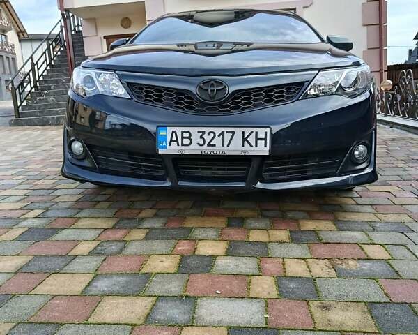 Синий Тойота Камри, объемом двигателя 2.49 л и пробегом 224 тыс. км за 10900 $, фото 1 на Automoto.ua