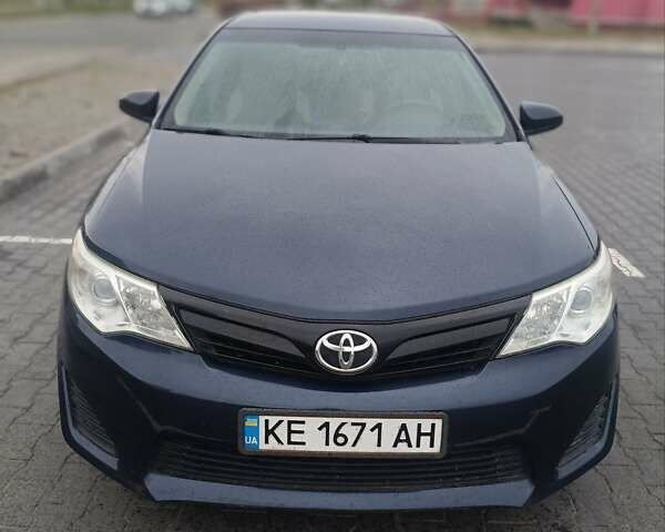 Синий Тойота Камри, объемом двигателя 2.5 л и пробегом 157 тыс. км за 12000 $, фото 1 на Automoto.ua