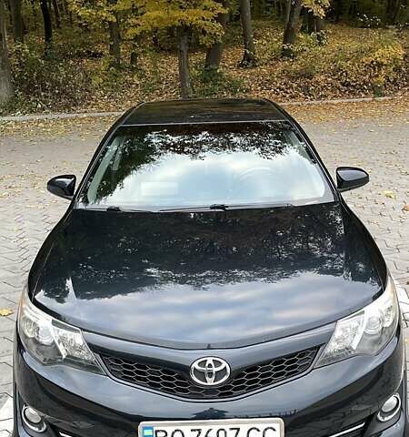 Синий Тойота Камри, объемом двигателя 2.49 л и пробегом 247 тыс. км за 14000 $, фото 1 на Automoto.ua