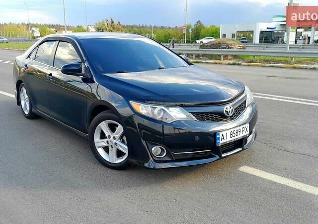 Синий Тойота Камри, объемом двигателя 2.5 л и пробегом 225 тыс. км за 11900 $, фото 1 на Automoto.ua