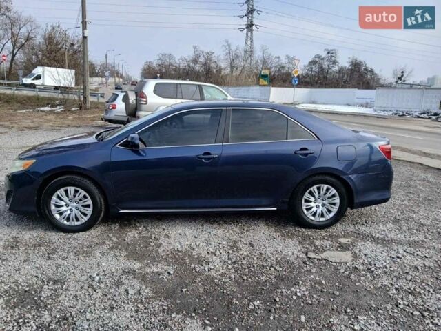 Синий Тойота Камри, объемом двигателя 2.5 л и пробегом 205 тыс. км за 9000 $, фото 1 на Automoto.ua