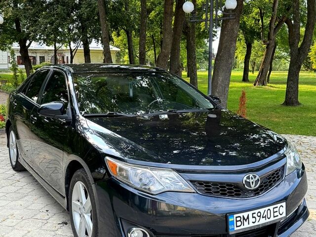 Синій Тойота Камрі, об'ємом двигуна 2.5 л та пробігом 230 тис. км за 11500 $, фото 1 на Automoto.ua