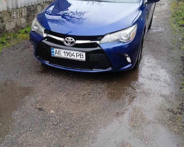 Синий Тойота Камри, объемом двигателя 2.5 л и пробегом 130 тыс. км за 12700 $, фото 1 на Automoto.ua