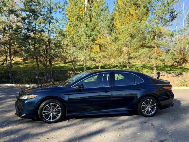 Синій Тойота Камрі, об'ємом двигуна 2.5 л та пробігом 124 тис. км за 23300 $, фото 1 на Automoto.ua