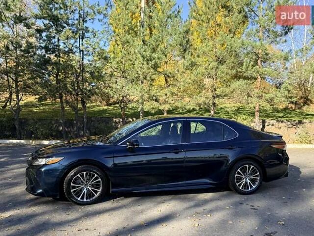 Синий Тойота Камри, объемом двигателя 2.49 л и пробегом 124 тыс. км за 23500 $, фото 1 на Automoto.ua