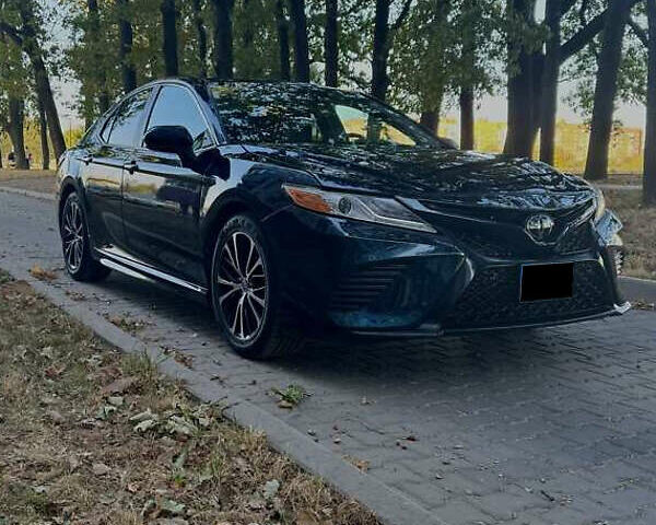 Синий Тойота Камри, объемом двигателя 2.49 л и пробегом 118 тыс. км за 19700 $, фото 1 на Automoto.ua