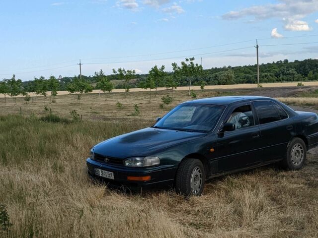 Зеленый Тойота Камри, объемом двигателя 2.2 л и пробегом 500 тыс. км за 2050 $, фото 1 на Automoto.ua