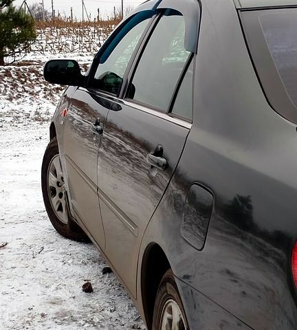 Зеленый Тойота Камри, объемом двигателя 2.4 л и пробегом 333 тыс. км за 5200 $, фото 1 на Automoto.ua