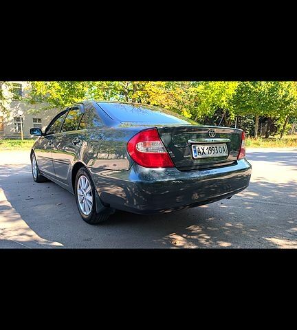 Зеленый Тойота Камри, объемом двигателя 3 л и пробегом 476 тыс. км за 6000 $, фото 1 на Automoto.ua