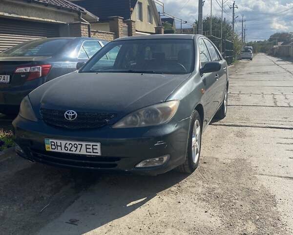 Зеленый Тойота Камри, объемом двигателя 2.4 л и пробегом 318 тыс. км за 3600 $, фото 1 на Automoto.ua