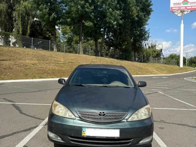 Зелений Тойота Камрі, об'ємом двигуна 2.4 л та пробігом 300 тис. км за 3437 $, фото 1 на Automoto.ua