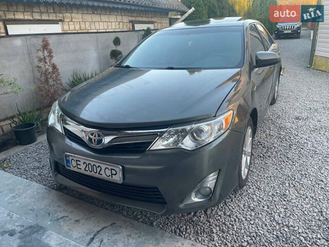 Зелений Тойота Камрі, об'ємом двигуна 2.49 л та пробігом 259 тис. км за 13000 $, фото 1 на Automoto.ua