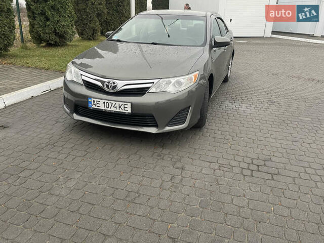 Зелений Тойота Камрі, об'ємом двигуна 2.49 л та пробігом 197 тис. км за 10400 $, фото 1 на Automoto.ua