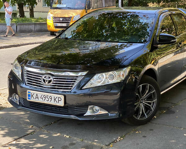 Зеленый Тойота Камри, объемом двигателя 2.49 л и пробегом 202 тыс. км за 14300 $, фото 1 на Automoto.ua