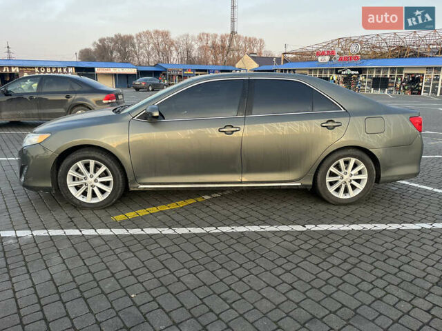 Зелений Тойота Камрі, об'ємом двигуна 2.49 л та пробігом 100 тис. км за 13500 $, фото 1 на Automoto.ua