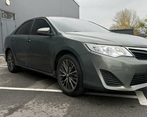 Зелений Тойота Камрі, об'ємом двигуна 2.49 л та пробігом 125 тис. км за 12800 $, фото 1 на Automoto.ua
