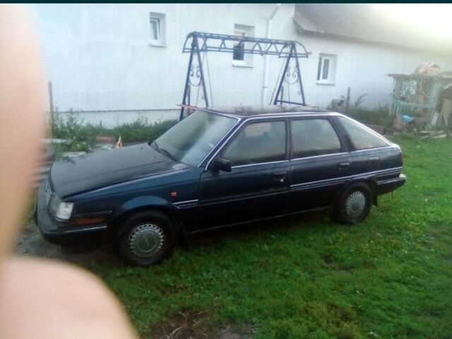 Черный Тойота Карина, объемом двигателя 1 л и пробегом 2 тыс. км за 300 $, фото 1 на Automoto.ua