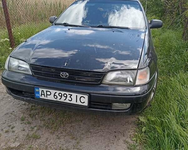 Черный Тойота Карина, объемом двигателя 1.76 л и пробегом 293 тыс. км за 2650 $, фото 1 на Automoto.ua
