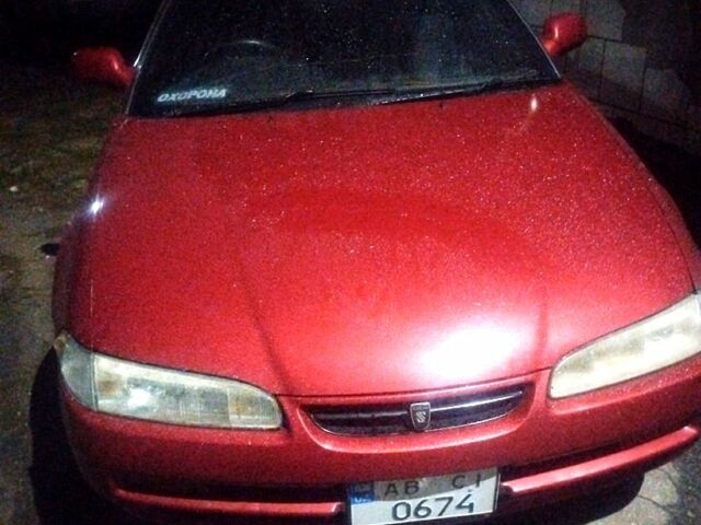 Красный Тойота Карина, объемом двигателя 1.6 л и пробегом 192 тыс. км за 900 $, фото 1 на Automoto.ua