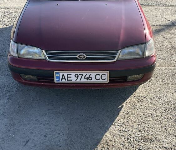 Красный Тойота Карина, объемом двигателя 2 л и пробегом 380 тыс. км за 2500 $, фото 1 на Automoto.ua