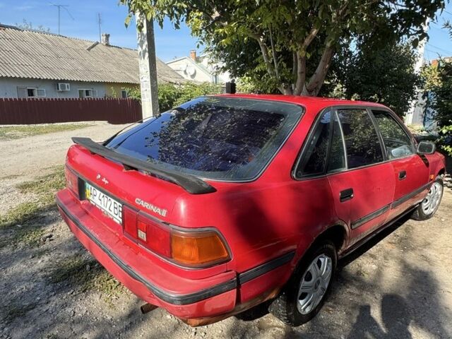 Червоний Тойота Каріна, об'ємом двигуна 1.6 л та пробігом 64 тис. км за 800 $, фото 1 на Automoto.ua