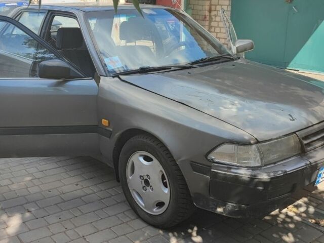 Серый Тойота Карина, объемом двигателя 1.6 л и пробегом 370 тыс. км за 952 $, фото 1 на Automoto.ua