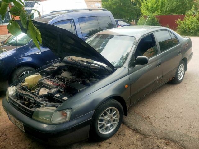 Серый Тойота Карина, объемом двигателя 1.6 л и пробегом 600 тыс. км за 1159 $, фото 1 на Automoto.ua