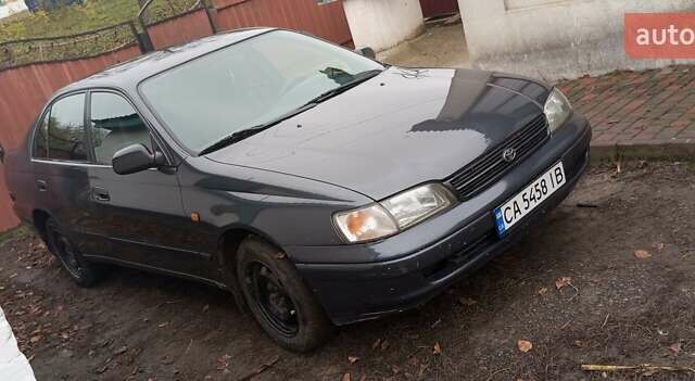Серый Тойота Карина, объемом двигателя 2 л и пробегом 404 тыс. км за 2999 $, фото 1 на Automoto.ua