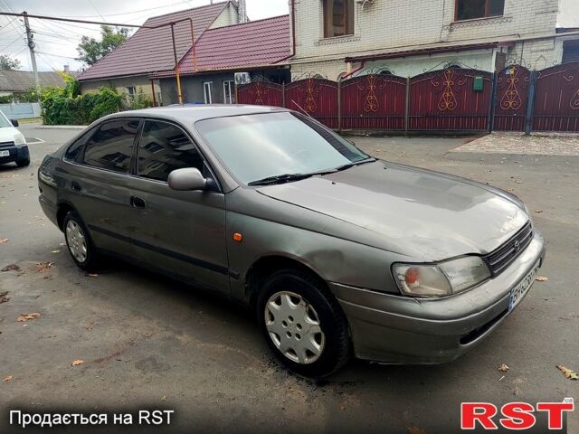 Серый Тойота Карина, объемом двигателя 1.6 л и пробегом 0 тыс. км за 1250 $, фото 1 на Automoto.ua