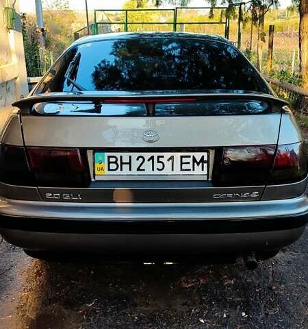 Сірий Тойота Каріна, об'ємом двигуна 2 л та пробігом 424 тис. км за 2900 $, фото 1 на Automoto.ua