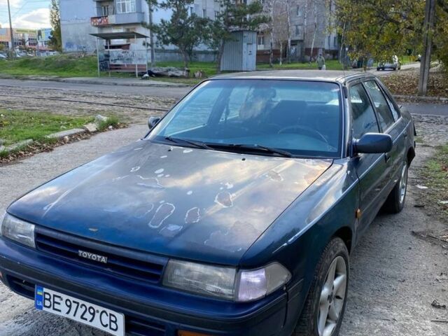 Синий Тойота Карина, объемом двигателя 1.6 л и пробегом 600 тыс. км за 600 $, фото 1 на Automoto.ua