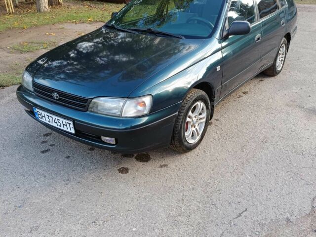 Зеленый Тойота Карина, объемом двигателя 1.6 л и пробегом 342 тыс. км за 3200 $, фото 1 на Automoto.ua