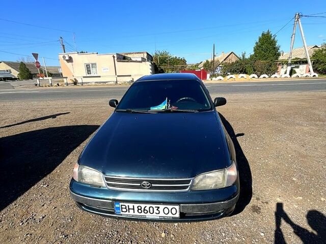 Зеленый Тойота Карина, объемом двигателя 2 л и пробегом 417 тыс. км за 2000 $, фото 1 на Automoto.ua